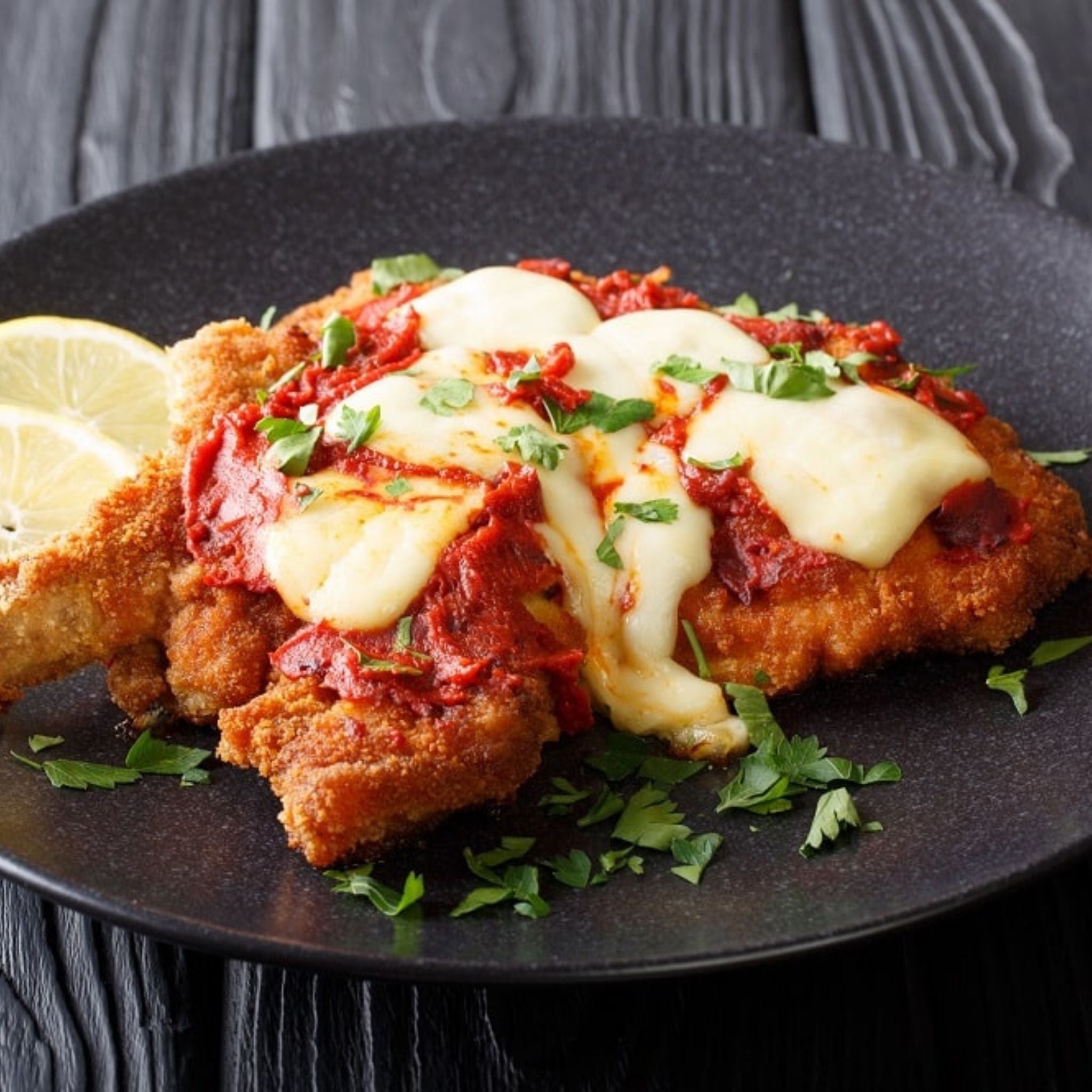 chicken-breast-free-range-locally-sourced-regular-free-range-parmigiana-and-lemon-garnish.jpg